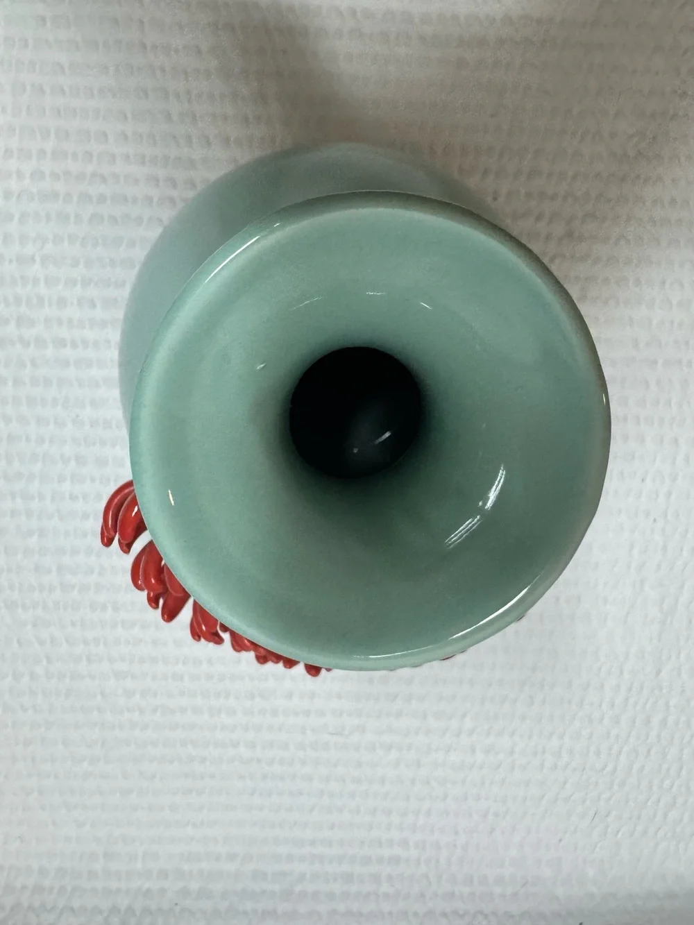 Anthropologie Ceramic Vase features a 3D red chrysanthemum bloom against a celad
